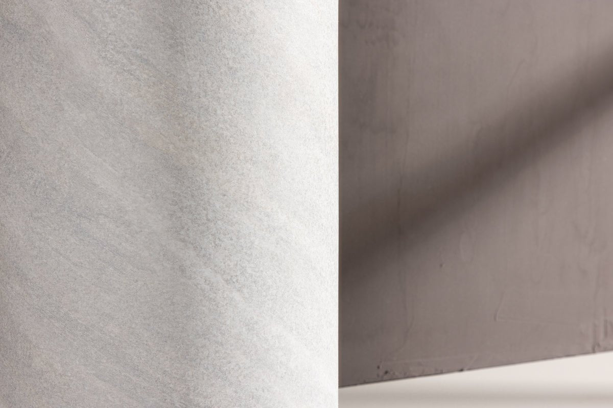 Konferenčný stolík/prístavný stolík Marlo - valcový tvar v sivej farbe