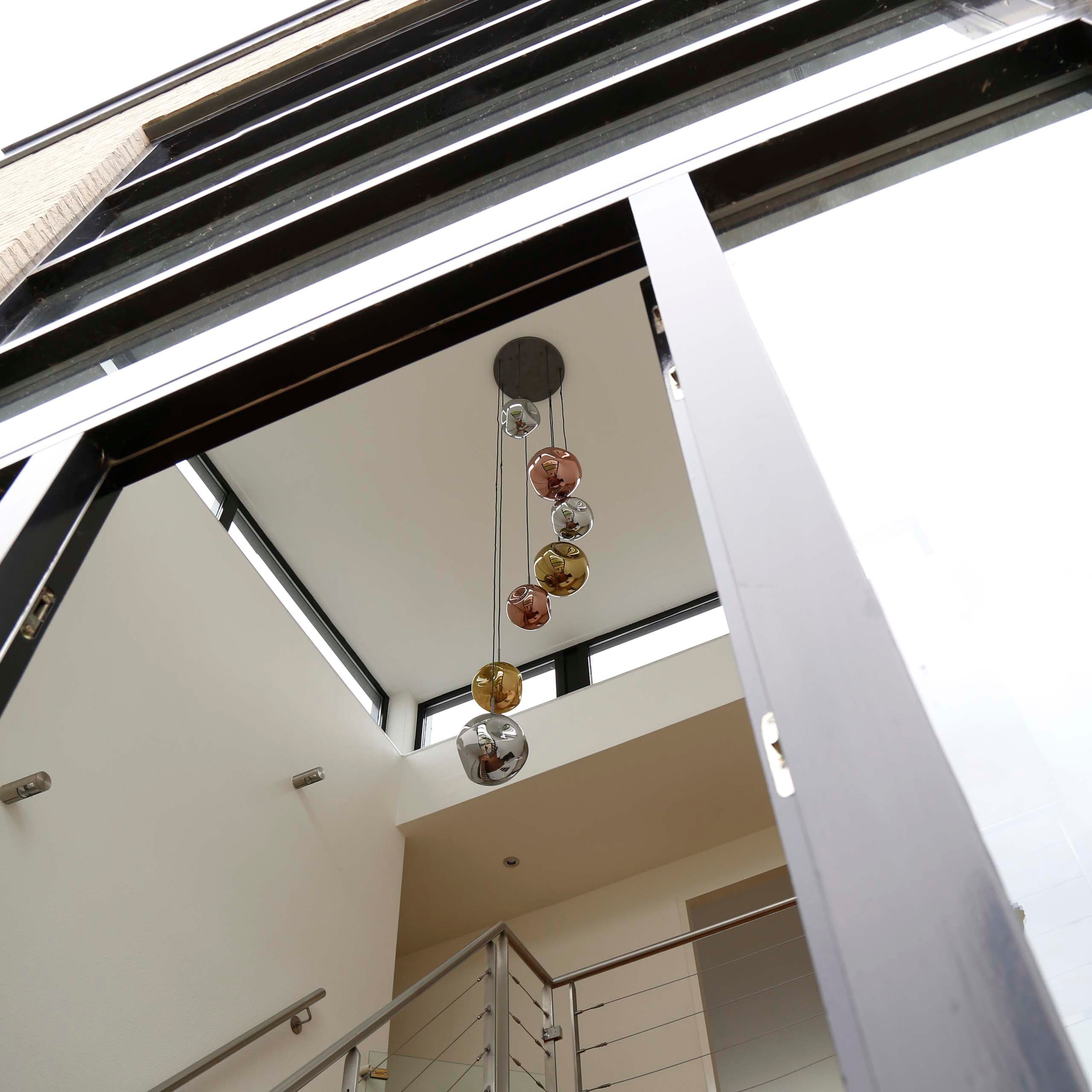 Pendelleuchte „Elaris“ – 7 Leuchten gestuft in der Metall-Farbkombination Gold,Kupfer und Chrom