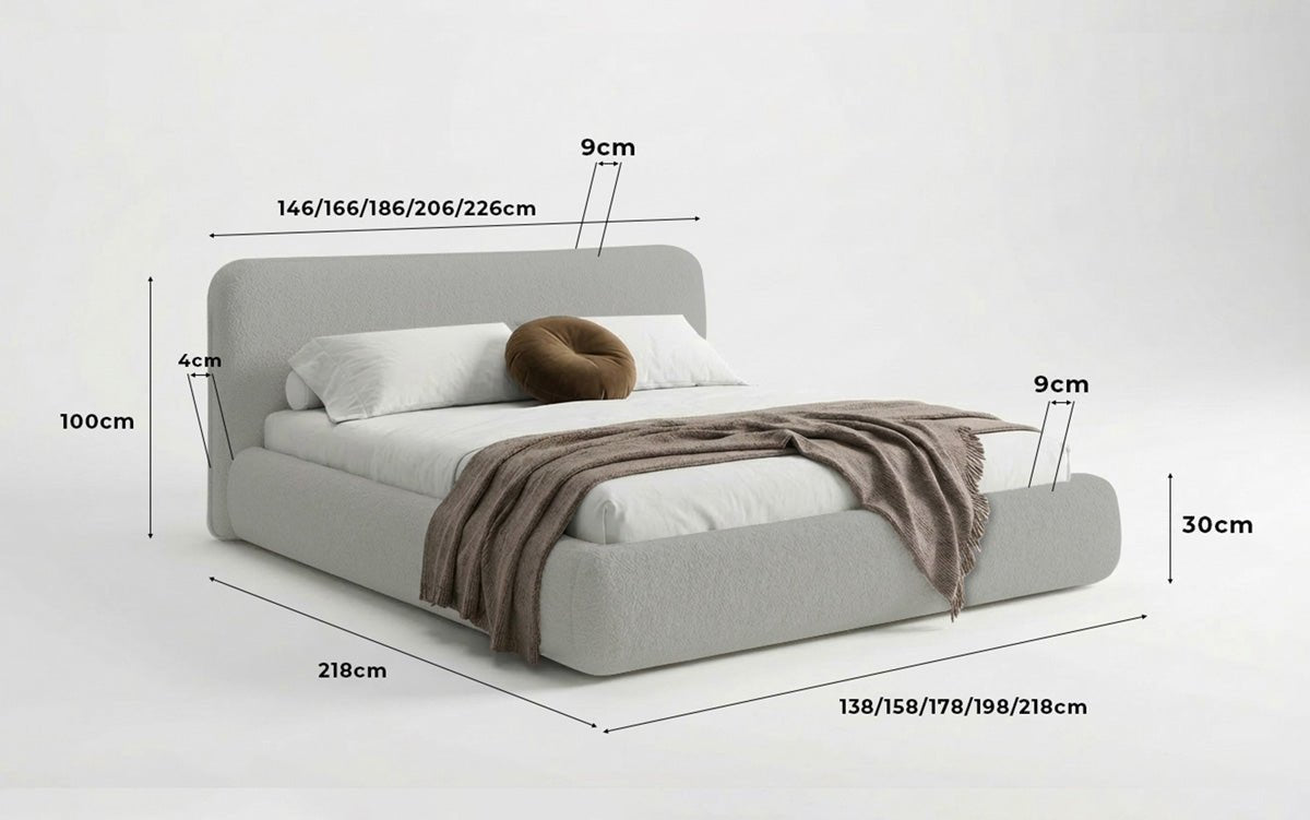 Dizajnová čalúnená posteľ Arosa s poťahom bouclé a úložným priestorom