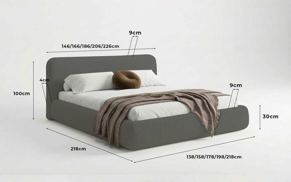 Dizajnová čalúnená posteľ Arosa s poťahom bouclé a úložným priestorom