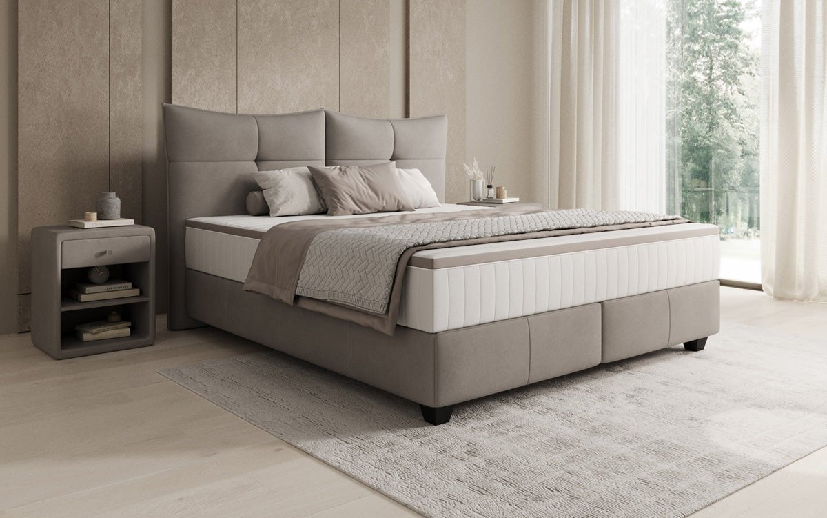 Boxspring posteľ Veyora v pravom koži