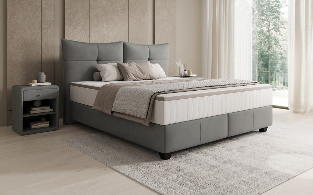 Boxspring posteľ Veyora v pravom koži