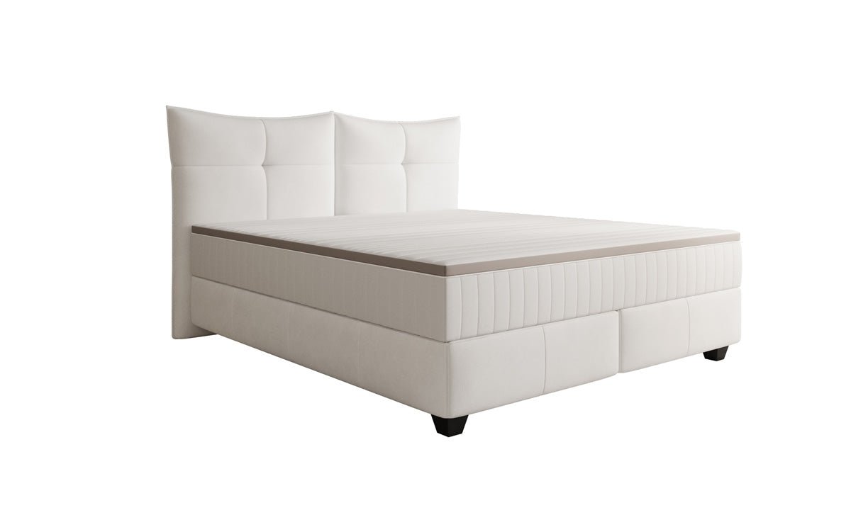 Boxspring posteľ Veyora v pravom koži