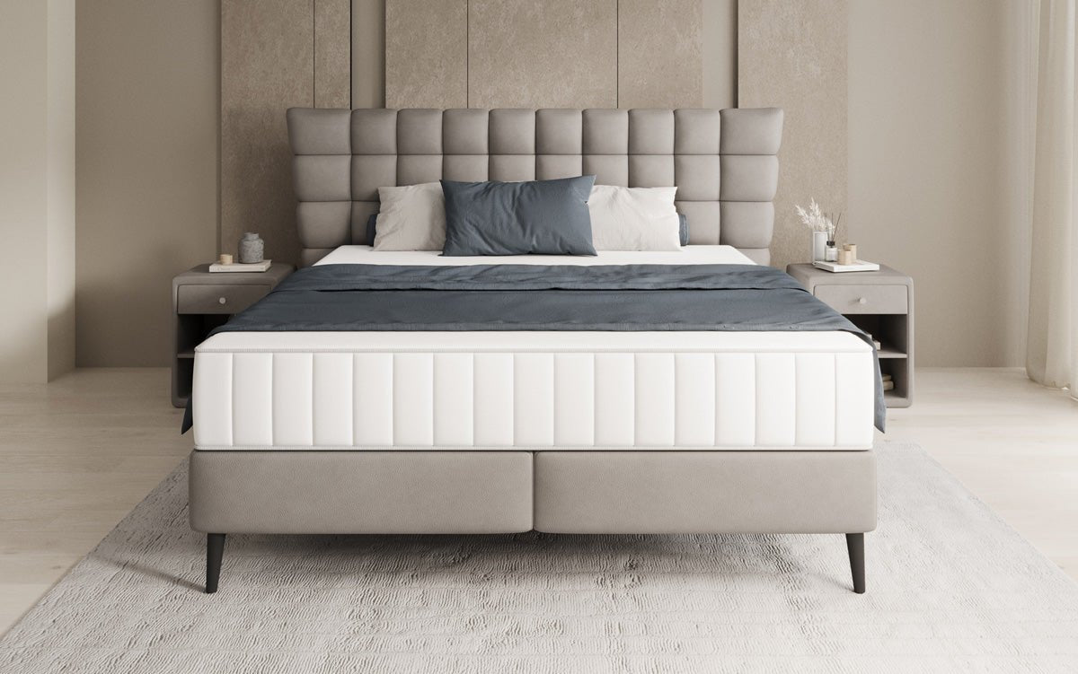 Boxspring posteľ Alvion v pravom koži