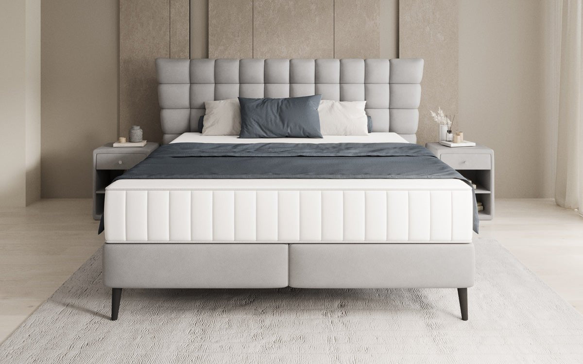 Boxspring posteľ Alvion v pravom koži