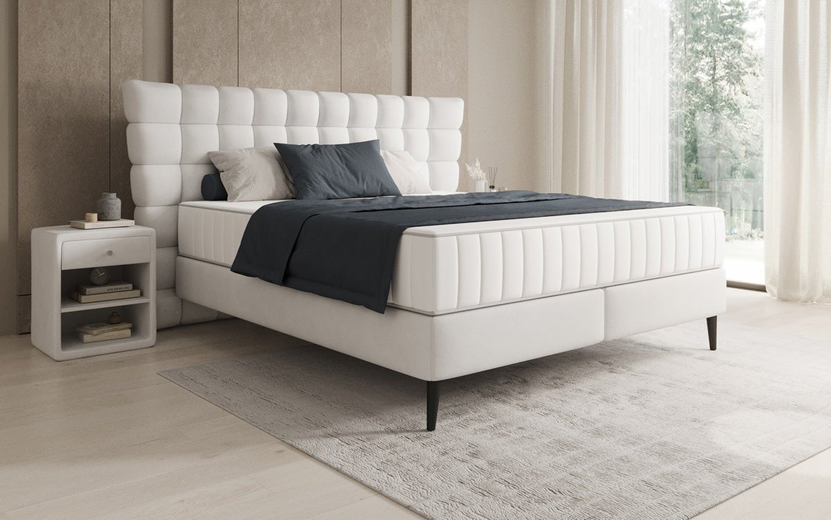 Boxspring posteľ Alvion v pravom koži