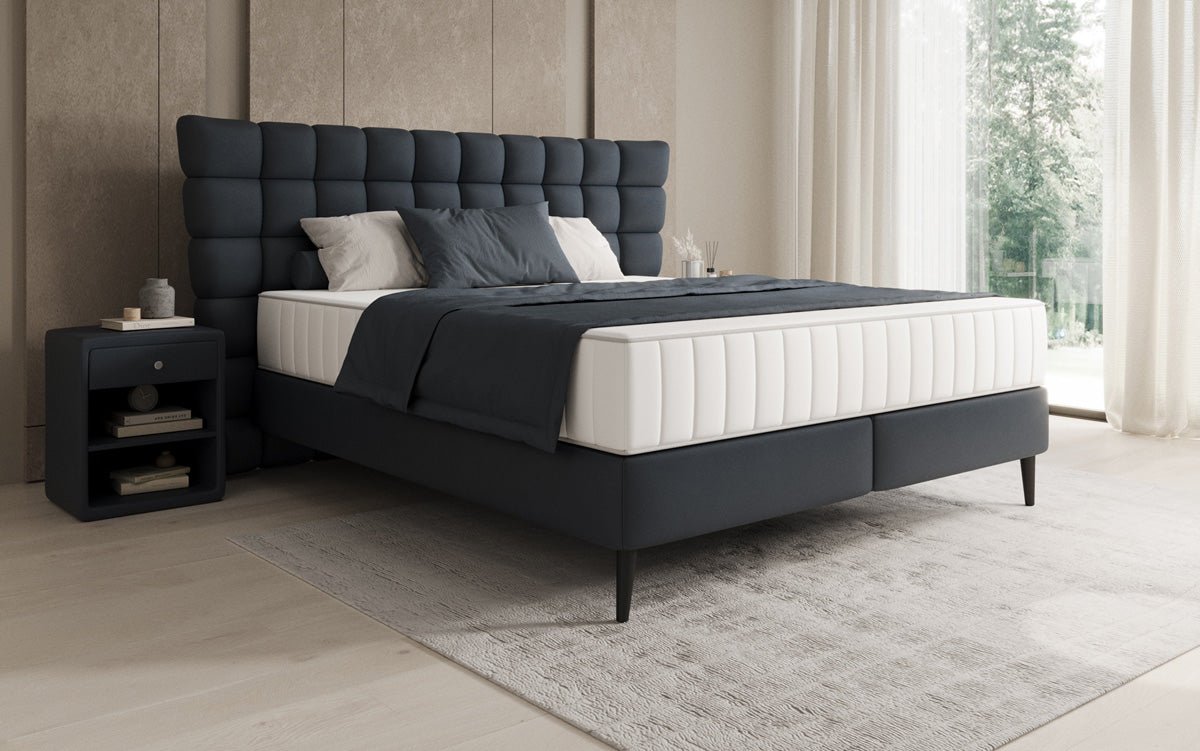 Boxspring posteľ Alvion v pravom koži