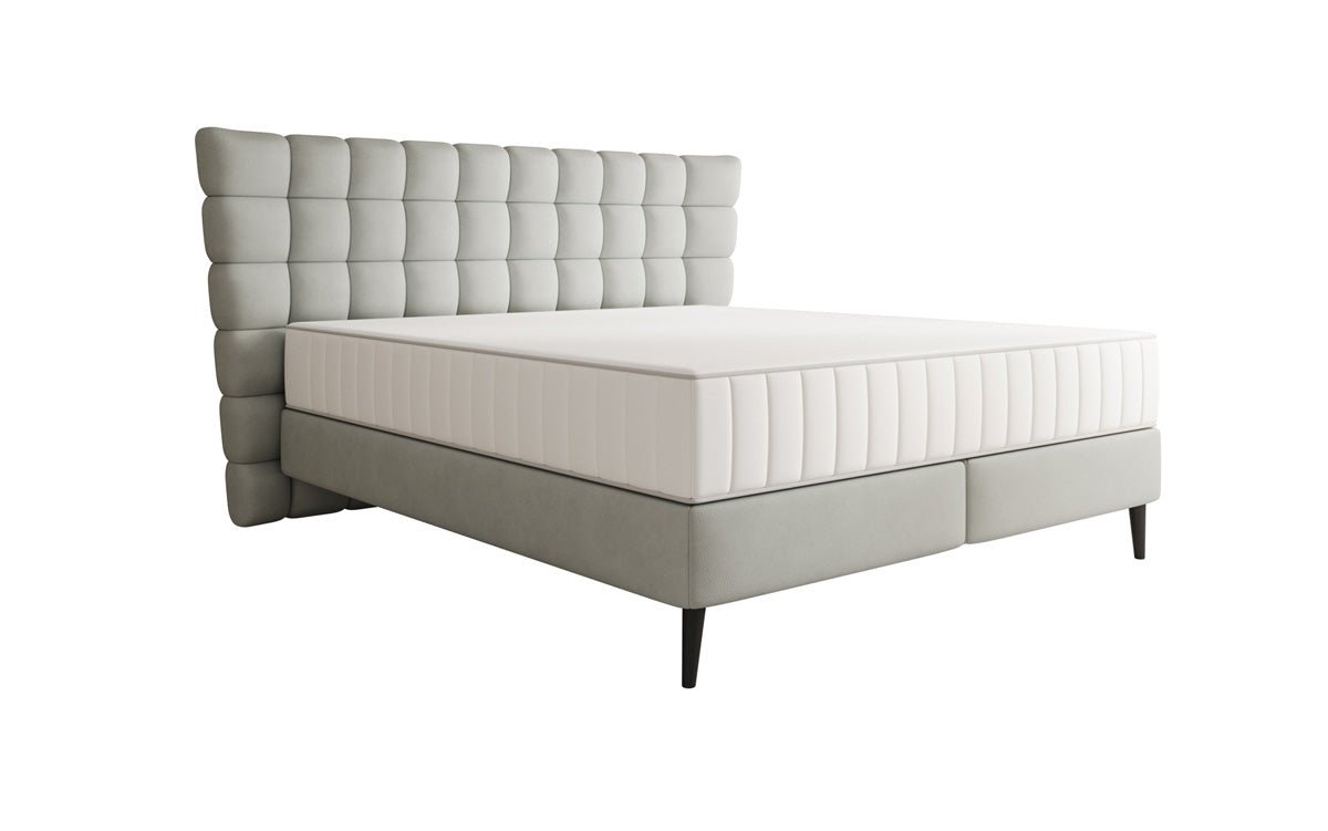 Boxspring posteľ Alvion v pravom koži