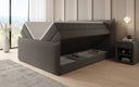 Boxspring posteľ Liana II s vysoko zdvíhateľným úložným priestorom v Teddy Bouclé