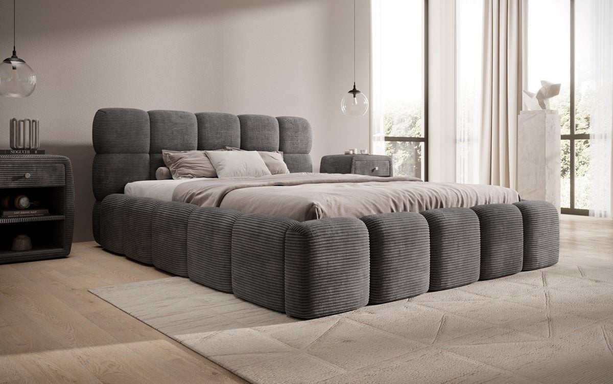 Dizajnová čalúnená posteľ Noeva z mančestra s úložným priestorom
