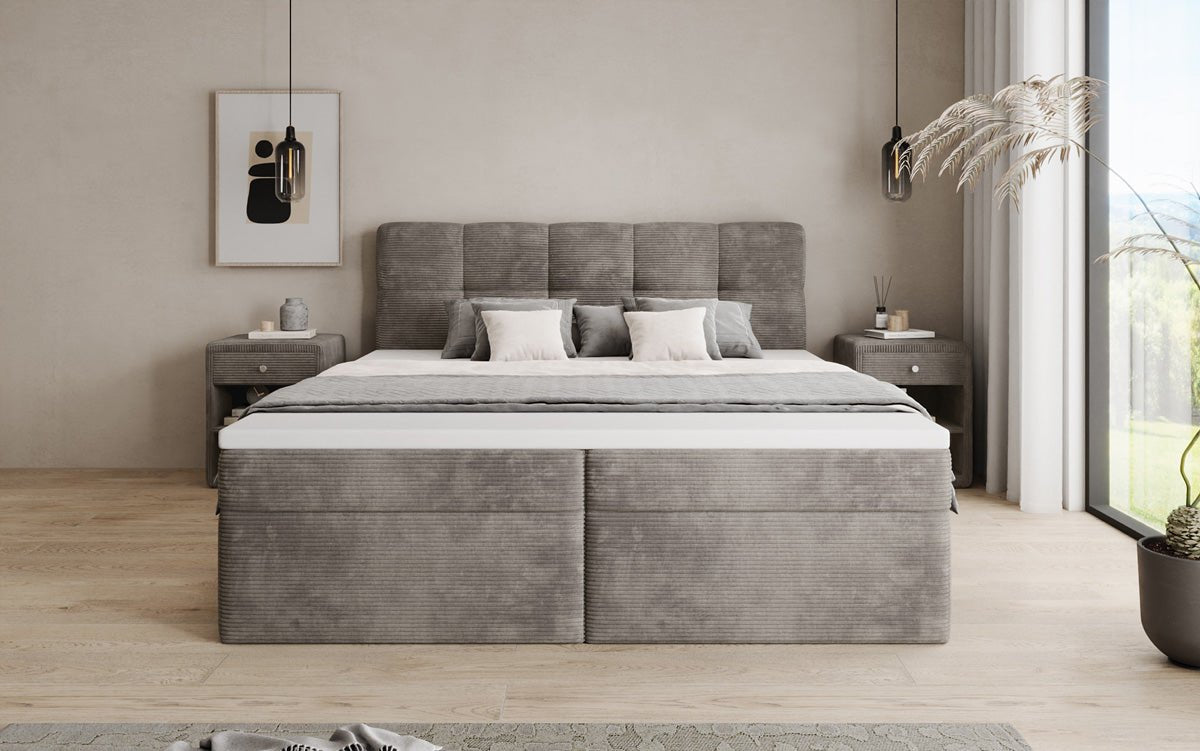 Boxspringová posteľ Cozy II v poťahu z látky Mančester s úložným priestorom