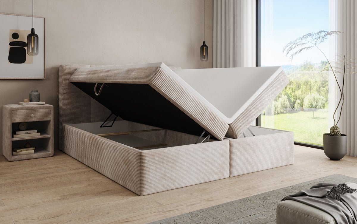 Boxspringová posteľ Cozy II v poťahu z látky Mančester s úložným priestorom