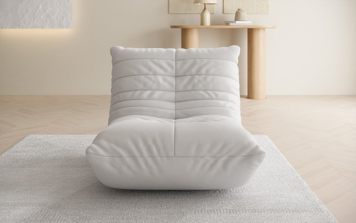 Dizajnérske pohovkové kreslo Calmo v pravom koženom prevedení